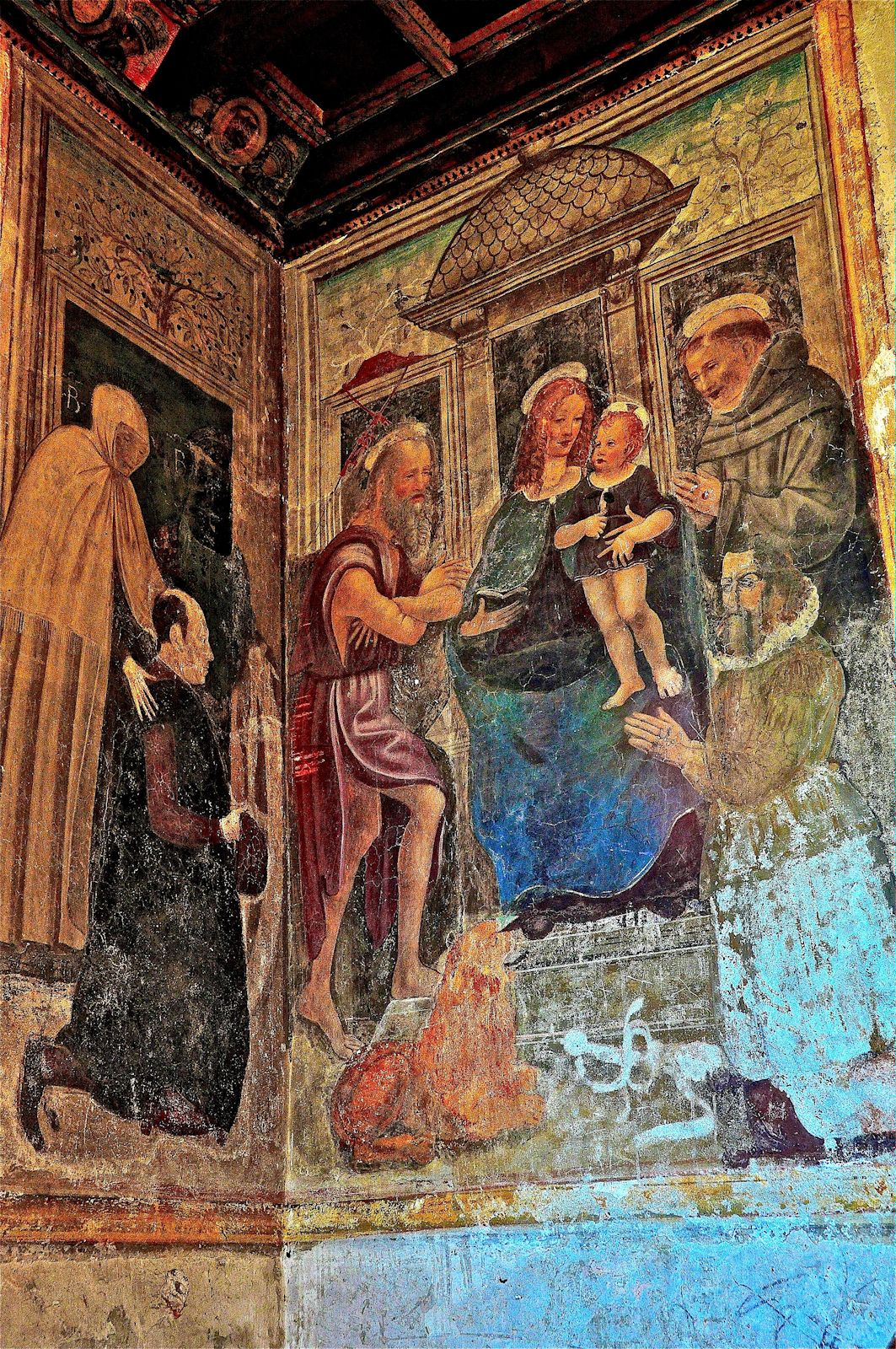 Fresko: Beatrix (ganz links) widmet ihren Sohn Graf Giovanni (unter ihr) <Hieronymus, Maria, Franziskus von Assisi und Katharina von Bologna, im Castello Visconteo der Grafen Rusca in Locarno